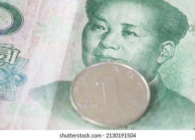 Close Up Of Chinese Banknotes And Coin, Chinese Yuan, CNY, RenMinBi, RMB(People's Replublic Of China Money) On Background. Finance Concept.