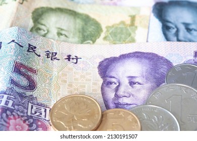 Close Up Of Chinese Banknotes And Coin, Chinese Yuan, CNY, RenMinBi, RMB(People's Replublic Of China Money) On Background. Finance Concept.