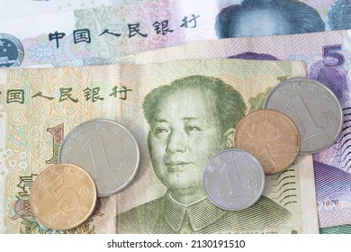 Close Up Of Chinese Banknotes And Coin, Chinese Yuan, CNY, RenMinBi, RMB(People's Replublic Of China Money) On Background. Finance Concept.