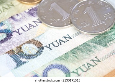 Close Up Of Chinese Banknotes And Coin, Chinese Yuan, CNY, RenMinBi, RMB(People's Replublic Of China Money) On Background. Finance Concept.