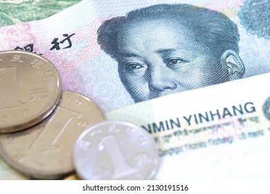 Close Up Of Chinese Banknotes And Coin, Chinese Yuan, CNY, RenMinBi, RMB(People's Replublic Of China Money) On Background. Finance Concept.