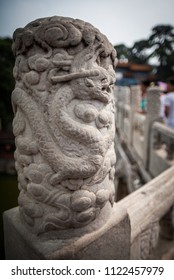 close up Chinese dragon on stone railing in Grand National Palace.