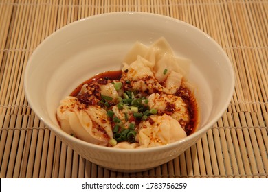 Close Up Of  Chinese Sichuan Province Style Cuisine  Shrimp Wonton With Chili Oil Sauce