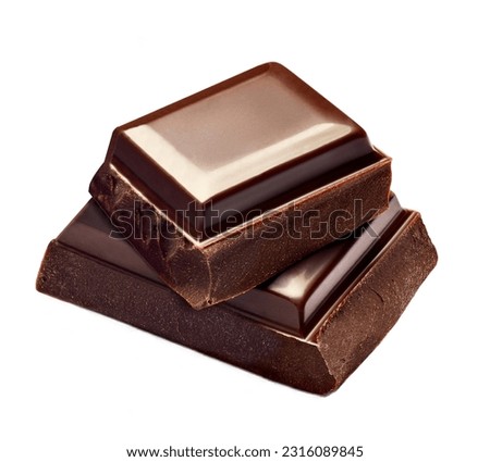 close up of chocolate pieces stack  on white background