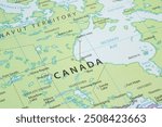 Close up to a Churchill city with a white pin needle into Canada country political map 