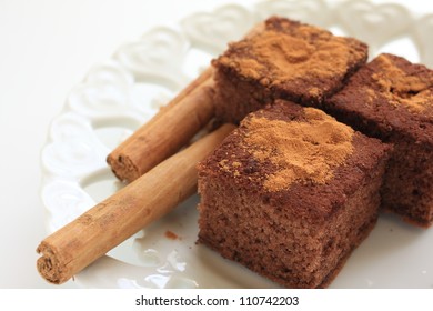 Close Up Of Cinnamon Stick And Cake