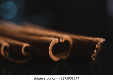 Close up of cinnamon sticks used to make cocktails in a pub - Powered by Shutterstock