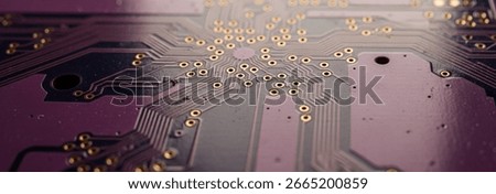 Close up of a circuit board with gold elements on a purple background, blending luxury tones with futuristic design, often used in conceptual electronics branding