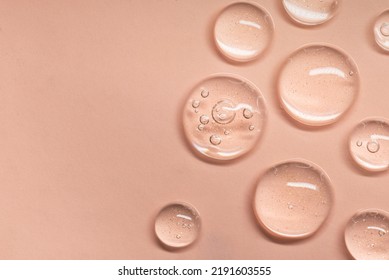 Close up Clear liquid cosmetic product. Gel texture with bubbles, skin care prodict - Powered by Shutterstock