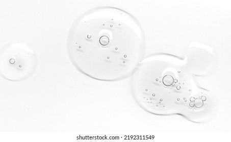 Close up Clear liquid cosmetic product. Gel texture with bubbles, skin care prodict - Shutterstock ID 2192311549