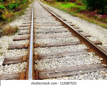 Close up / closeup of a speedway / railroad / old rail / railroad track