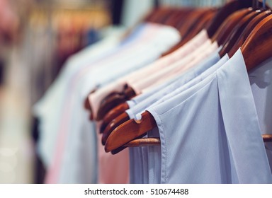 Close Up Clothes Hang On Clothes Rack In Clothing Store With Sweet Tone