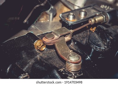 A Close Up Of The Clutch Cable On A Motorcycle Engine