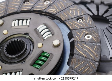Close up of clutch disc of manual gearbox car, selective focus. Car clutch repair kit. Automotive spare parts. - Shutterstock ID 2150579249