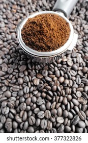Close up of coffee beans background take with selective color technique and art lighting