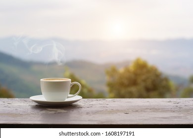 Close up coffee espresso on wood table nature background in garden, - Powered by Shutterstock