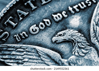 Close Up Coin Of US Dollar With The Inscription: In God We Trust. Macro Image.