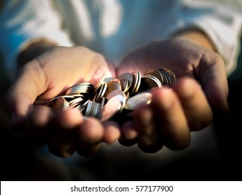 Close Up Coins In Hand For Lending, Financial Concept