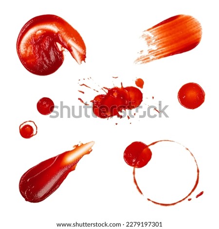 Close up collection of different red ketchup tomato sauce wet stains isolated on white background, top view, directly above
