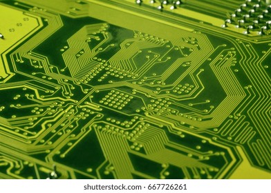 Close up of colored micro circuit board. Abstract technology background. Computer mechanism in details