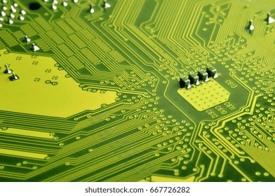 Close up of colored micro circuit board. Abstract technology background. Computer mechanism in details