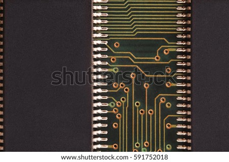 Close up of colored micro circuit board. Abstract technology background. Computer mechanism in details