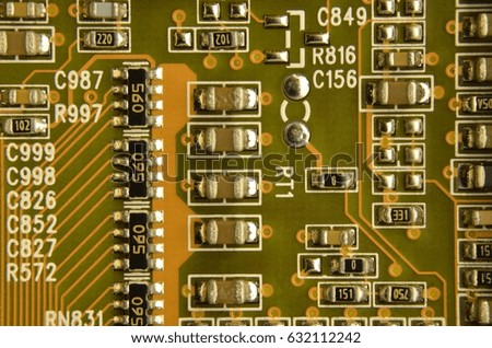 Close up of colored micro circuit board. Abstract technology background. Computer mechanism in details