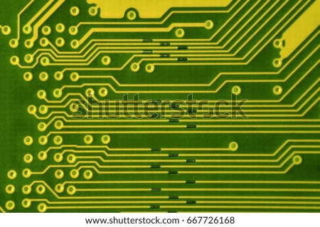 Close up of colored micro circuit board. Abstract technology background. Computer mechanism in details