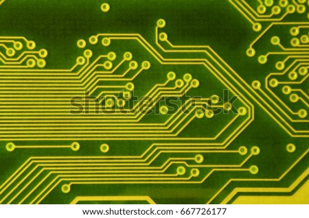 Close up of colored micro circuit board. Abstract technology background. Computer mechanism in details
