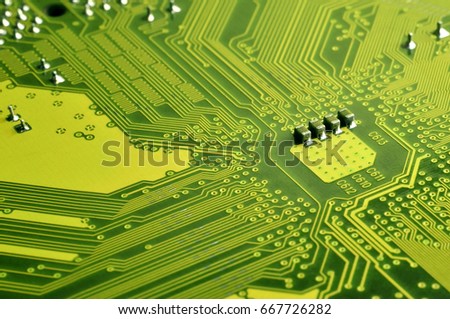 Close up of colored micro circuit board. Abstract technology background. Computer mechanism in details