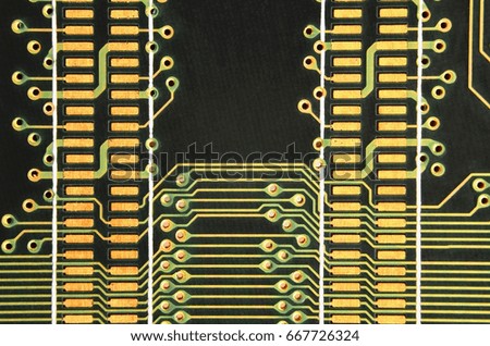 Close up of colored micro circuit board. Abstract technology background. Computer mechanism in details