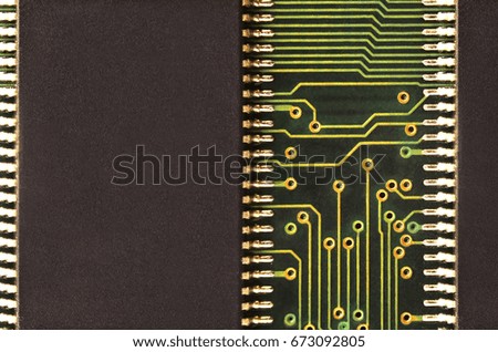 Close up of colored micro circuit board. Abstract technology background. Computer mechanism in details