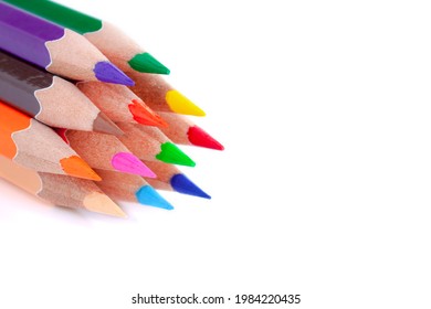 Close up colored pencils, sharp, colorful on white background.