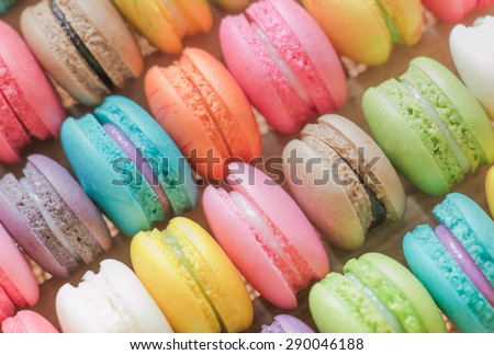 Close up colorful macarons dessert with vintage pastel tones