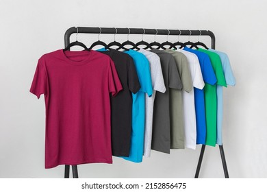 Colorful T-Shirts on Hangers - Premium Photo