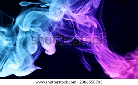 Close up of colorfull pink and blue smoke