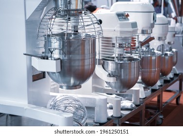 Close up of commercial bread mixer. Food mixing machine for food industry - Powered by Shutterstock