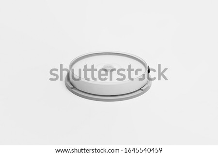 Close compact plastic disc box case with white isolated blank for branding design. CD jewel mock-up on soft gray background. DVD or CD disc