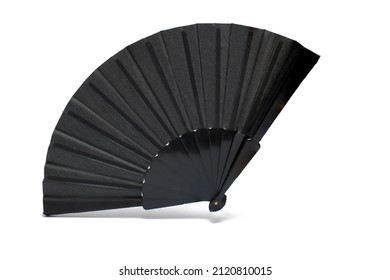 Close up of completely opened black classic fan to fan cool air on hot days on white background Spanish culture and mourning concept