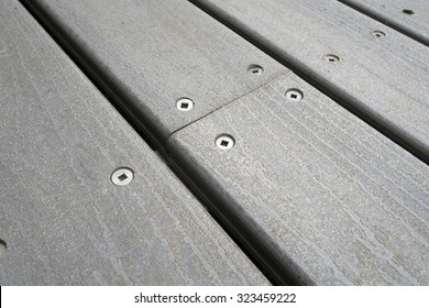 Close Up Of Composite Decking With Screws