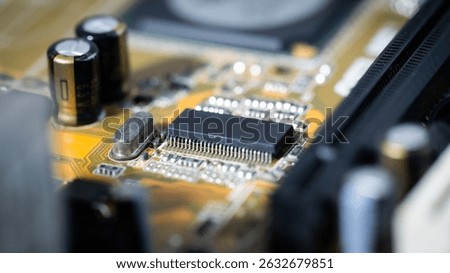 A close up of a computer chip. The chip is black and silver