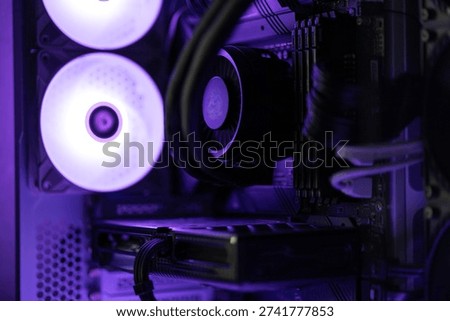 Close Up of Computer CPU Liquid Cooler Block with Neon Purple RGB Lighting