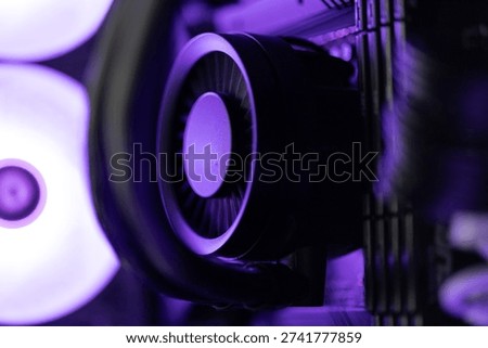 Close Up of Computer CPU Liquid Cooler Block with Neon Purple RGB Lighting