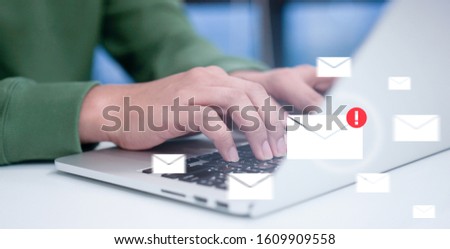 close up computer engineering writing programming code in database on laptop keyboard to protect and blocking spam email from internet and hacker for smart technology concept