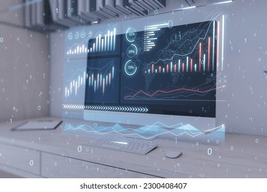 Close up of computer monitor on desktop with abstract glowing candlestick business chart on blurry background. Trade, finance, technology and market concept. Double exposure