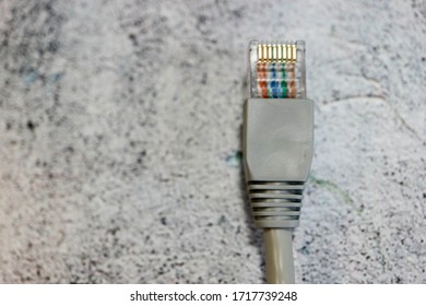 Close Up Of A Computer Network Cable With Connector Registered Jack