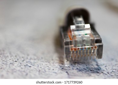 Close Up Of A Computer Network Cable With Connector Registered Jack