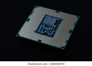 Close up of Computer Processor on Black Reflective Background - Powered by Shutterstock - Get 15% off with code: PIKWIZARD15