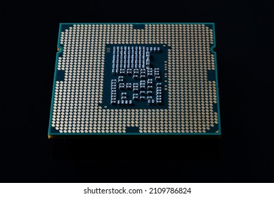 Close up of Computer Processor on Black Reflective Background