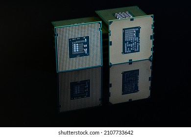 Close up of Computer Processors on Black Reflective Background